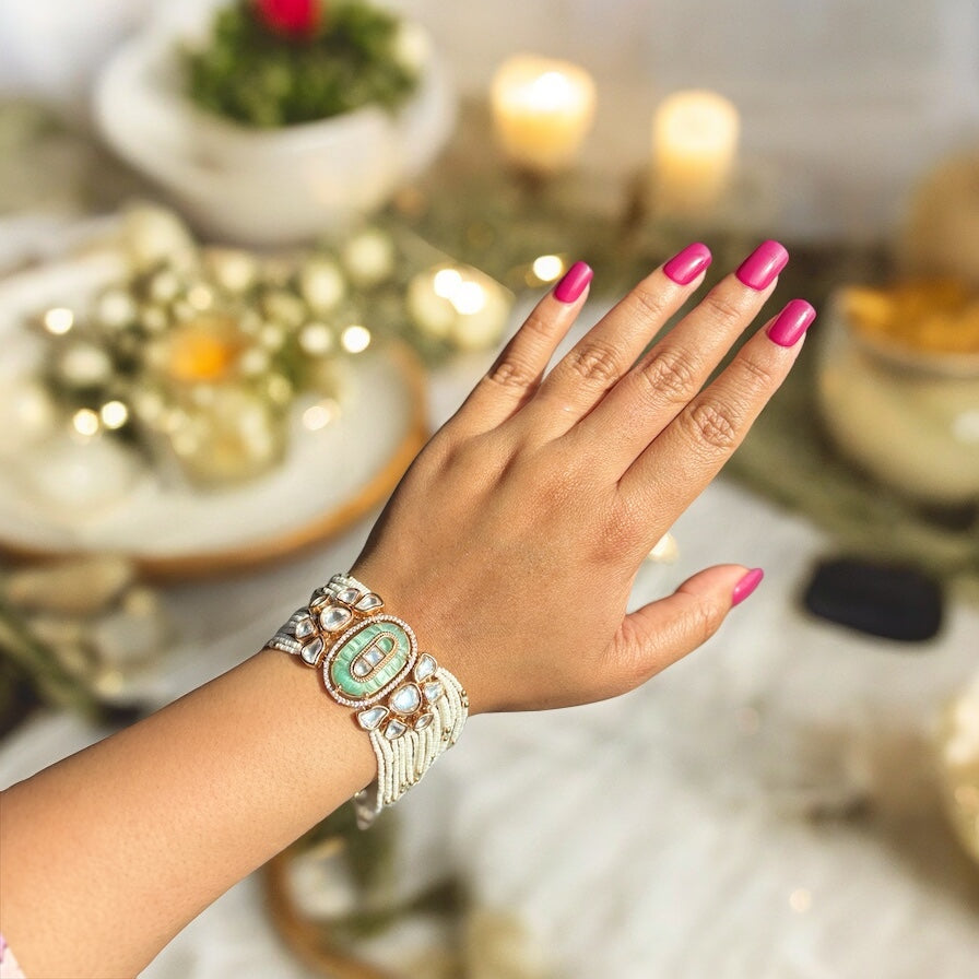 Kundan Bracelet with green stone in center